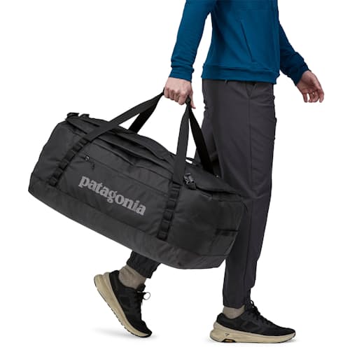 on model image of Black Hole Duffel Bag - 70L