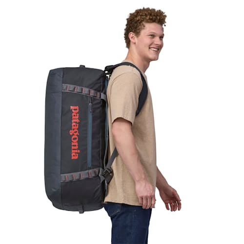 on model image of Black Hole Duffel Bag - 70L