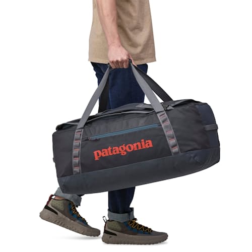 on model image of Black Hole Duffel Bag - 70L