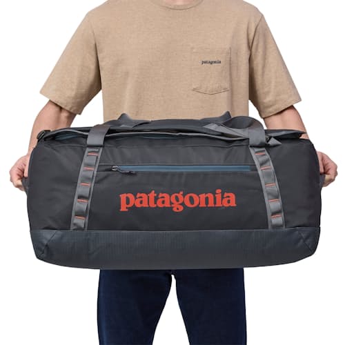 on model image of Black Hole Duffel Bag - 70L