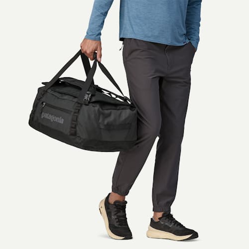 on model image of Black Hole Duffel Bag - 40L