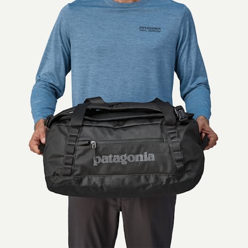 on model image of Black Hole Duffel Bag - 40L