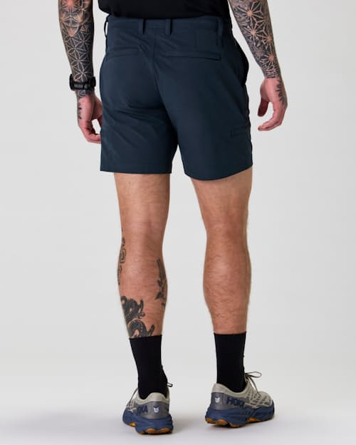 on model image of Equator Cargo Hybrid Short - 7"