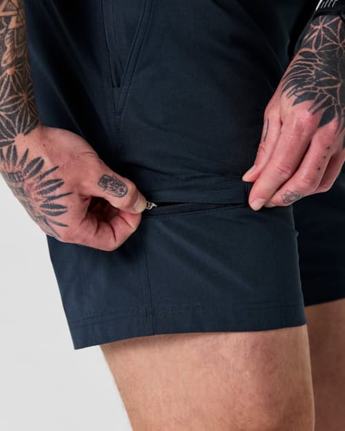 on model image of Equator Cargo Hybrid Short - 7"