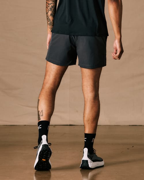 on model image of Equator Hybrid Short - 5"