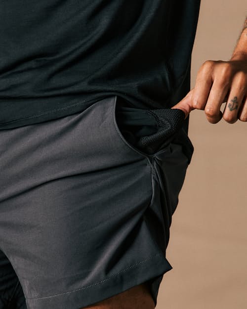 on model image of Equator Hybrid Short - 5"