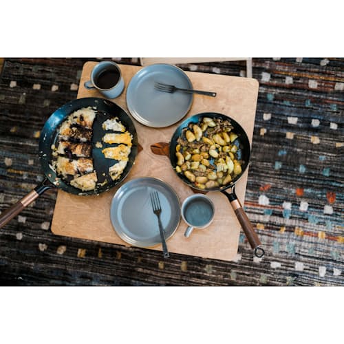 lifestyle image of Blue Carbon Steel Skillet