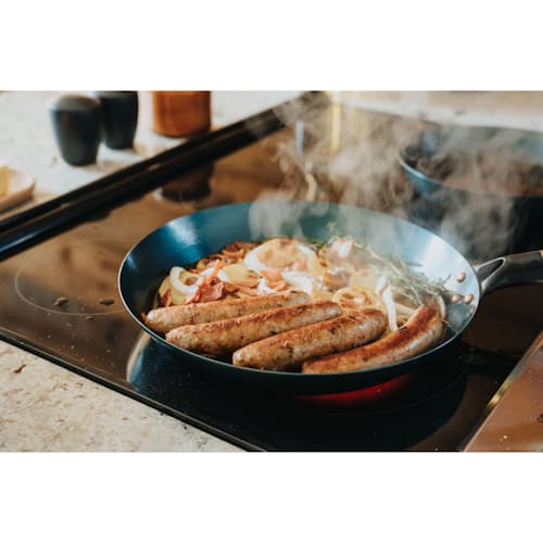 laydown image of Blue Carbon Steel Skillet