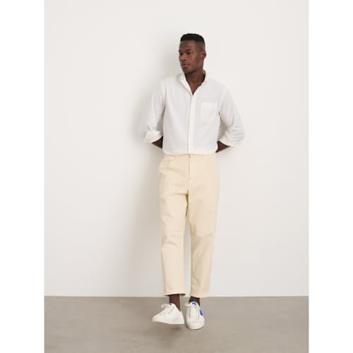on model image of Standard Pleated Chino Pant