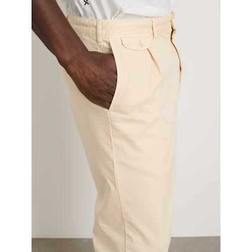 on model image of Standard Pleated Chino Pant