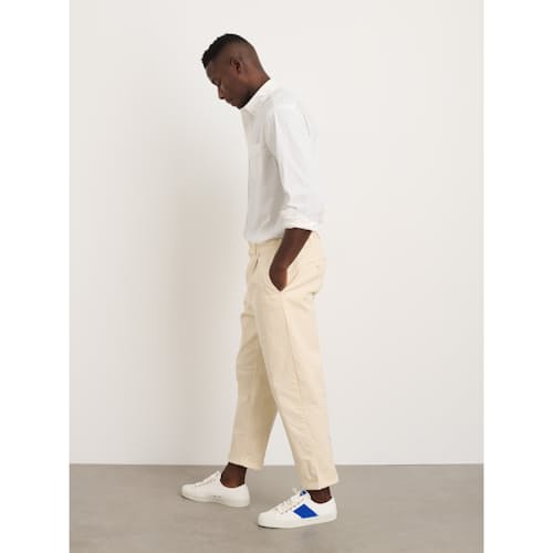on model image of Standard Pleated Chino Pant