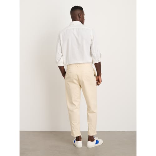 on model image of Standard Pleated Chino Pant