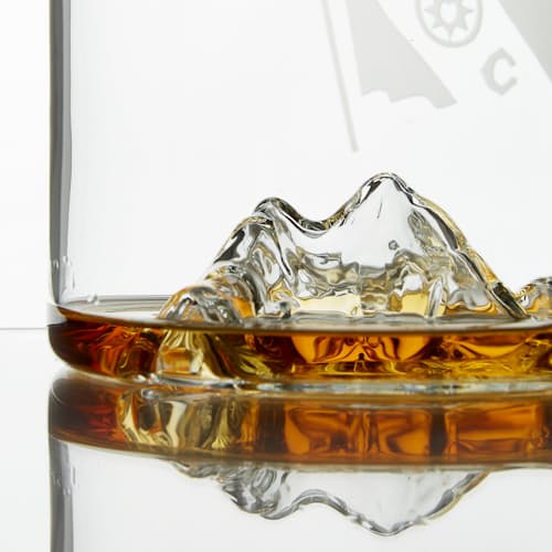 laydown image of Huckberry x The Explorers Club Decanter