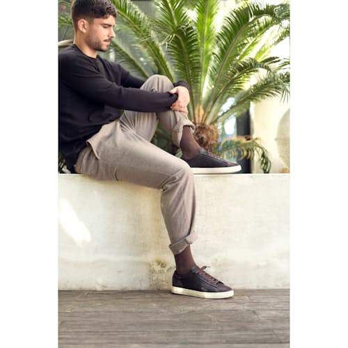 laydown image of Bradley Leather Sneaker