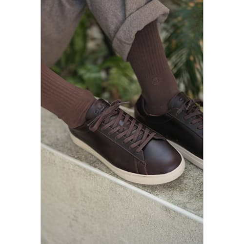 laydown image of Bradley Leather Sneaker
