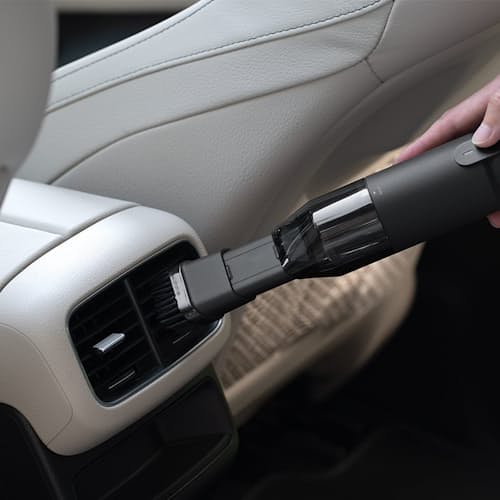 lifestyle image of Handheld Air Duster & Vacuum