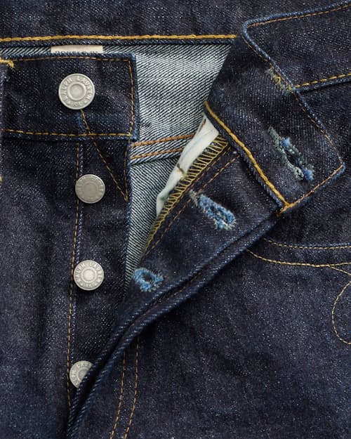 laydown detail image of Slim Fit Selvedge Bootcut Denim Jeans
