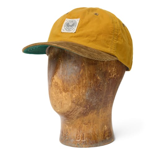 laydown image of Cotton Oil Cloth Sportsman Cap w/ Corduroy Bill