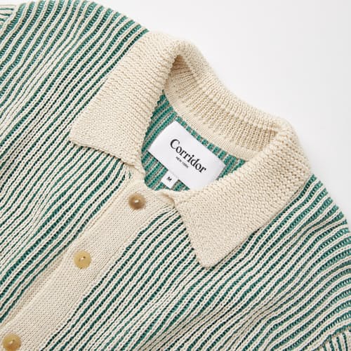 laydown detail image of Plated Striped Button Down Polo