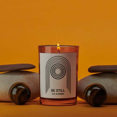 lifestyle image of Be Still Candle