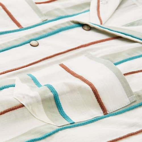 laydown detail image of Striped Pearl Snap Shirt