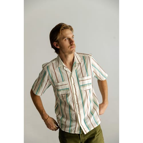 on model image of Striped Pearl Snap Shirt
