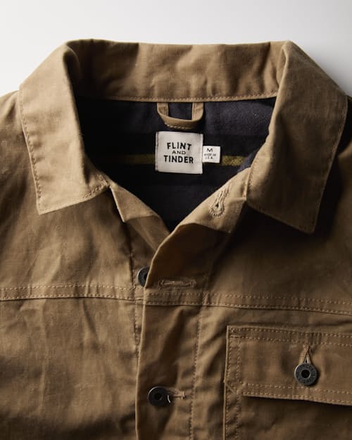 laydown detail image of Women's Flannel-Lined Waxed Trucker Jacket