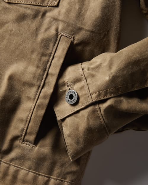 laydown detail image of Women's Flannel-Lined Waxed Trucker Jacket