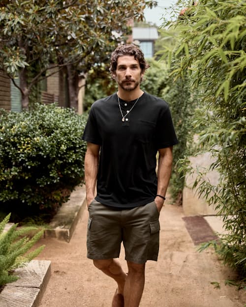 John is 6'0'' and wearing a size 32