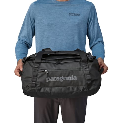 on model image of Black Hole Duffel Bag - 40L