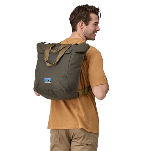 on model image of Waxed Canvas Tote Pack