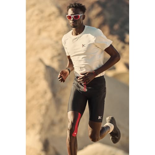 lifestyle image of Recycled Half Running Tights - 9"