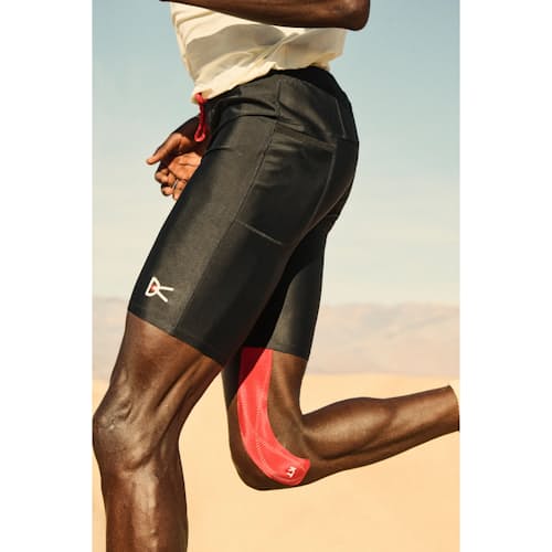 lifestyle image of Recycled Half Running Tights - 9"