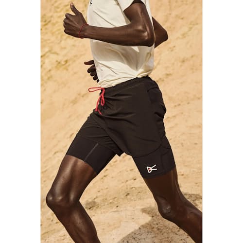 lifestyle image of Four-Way Stretch Layered Pocketed Trail Short