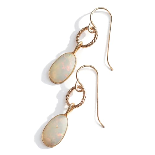laydown image of Women's White Fire Opal Rose Cut Earrings