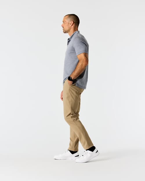 on model image of Nomad Performance Chino - HB Athletic Tapered