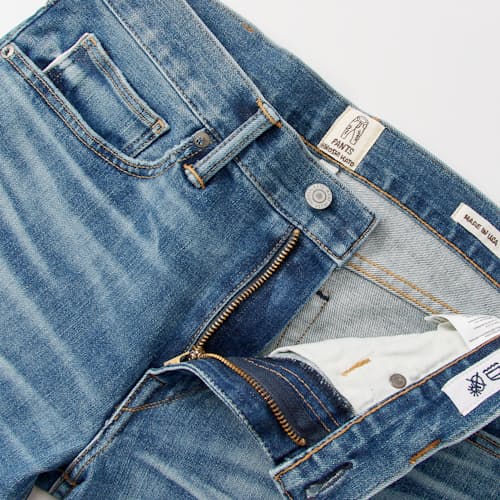 laydown detail image of The Pen Slim Stretch Selvedge Denim Jeans