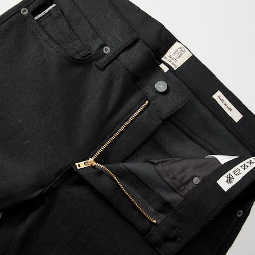 laydown detail image of The Pen Slim Stretch Selvedge Denim Jeans