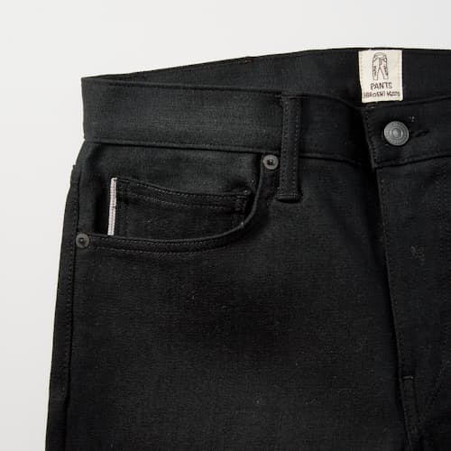laydown detail image of The Pen Slim Stretch Selvedge Denim Jeans