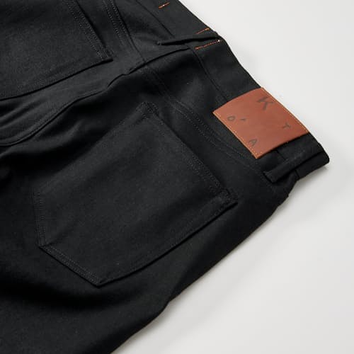 laydown detail image of The Pen Slim Stretch Selvedge Denim Jeans