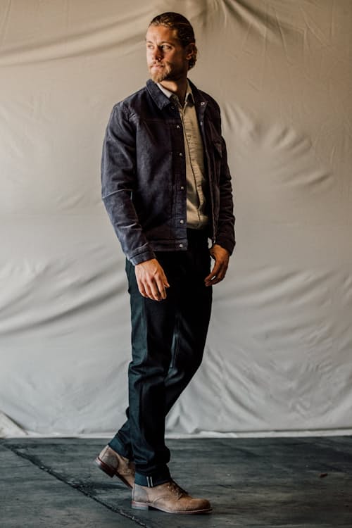 lifestyle image of The Pen Slim Straight Stretch Selvedge Denim Jeans
