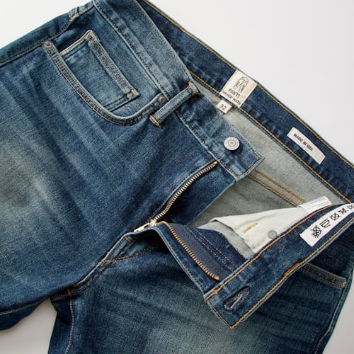 laydown detail image of The Pen Slim Stretch Selvedge Denim Jeans