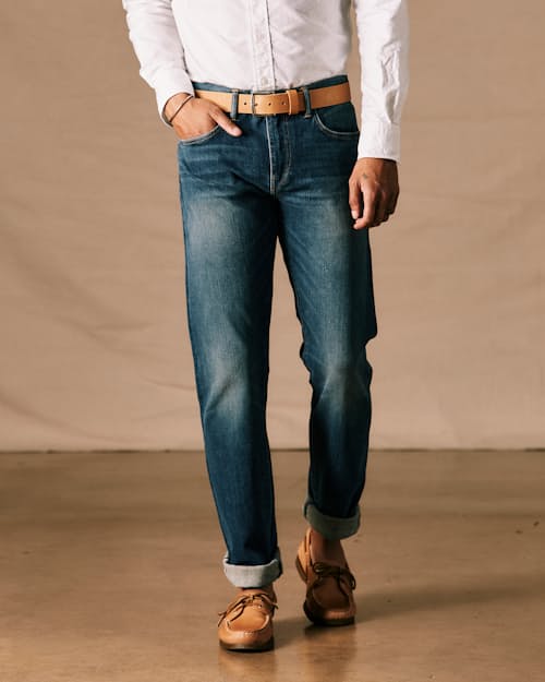 on model image of The Pen Slim Stretch Selvedge Denim Jeans