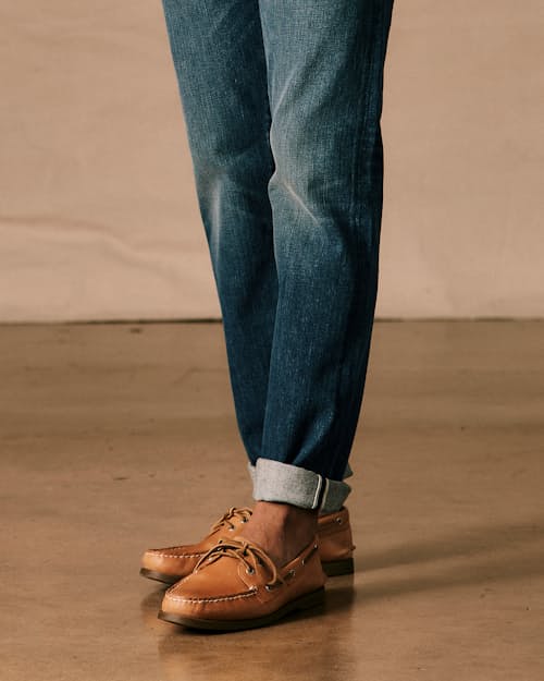 on model image of The Pen Slim Stretch Selvedge Denim Jeans