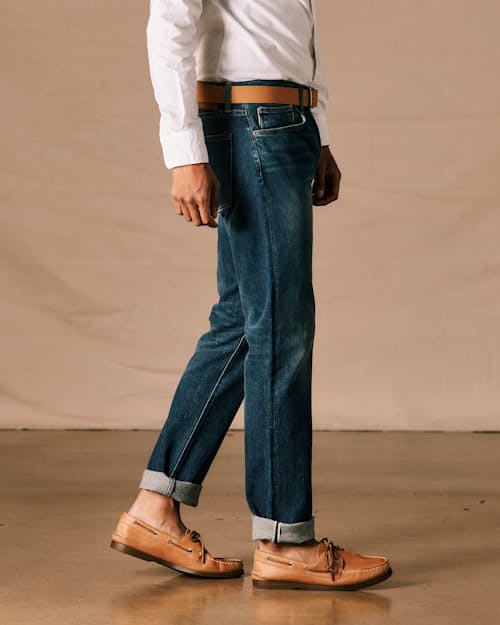 on model image of The Pen Slim Stretch Selvedge Denim Jeans