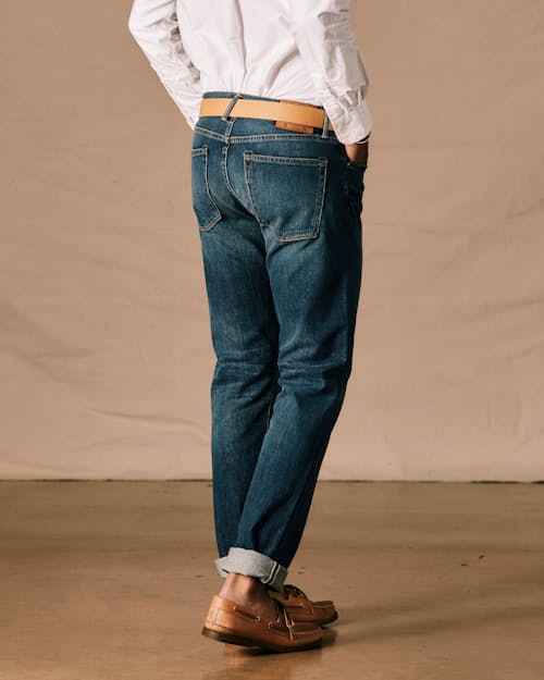on model image of The Pen Slim Stretch Selvedge Denim Jeans