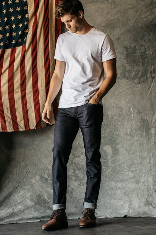 lifestyle image of The Pen Slim Straight Stretch Selvedge Denim Jeans