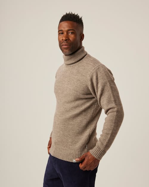 on model image of Merino Wool Turtleneck