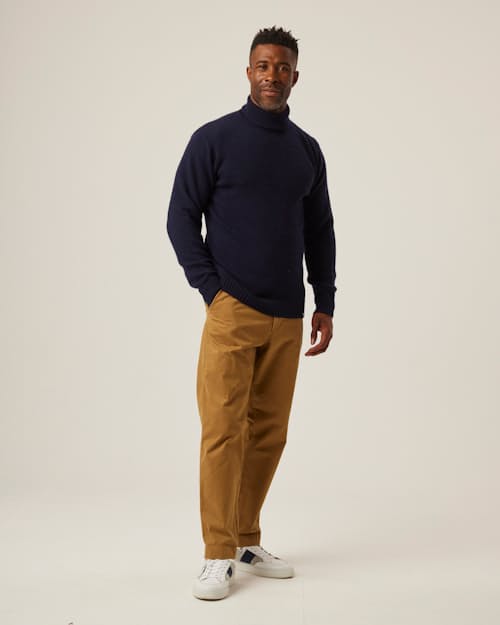 on model image of Merino Wool Turtleneck