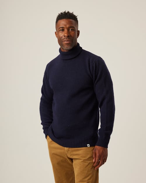 on model image of Merino Wool Turtleneck